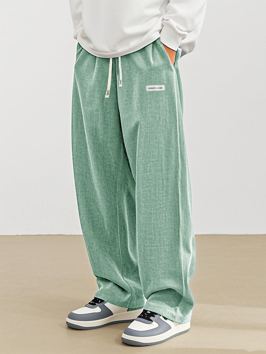 Men's Fashion Casual Everyday Hemp Fabric Pocket Embroidered Logo Loose Trousers