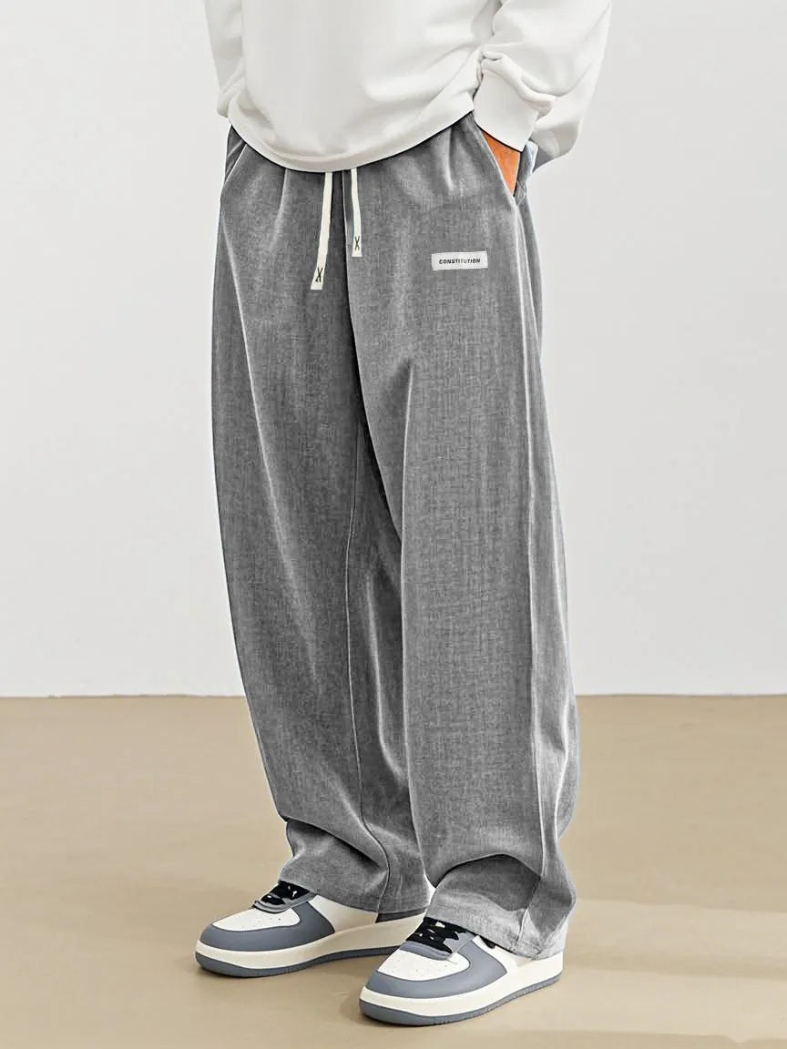 Men's Fashion Casual Everyday Hemp Fabric Pocket Embroidered Logo Loose Trousers