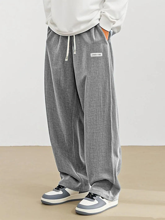 Men's Fashion Casual Everyday Hemp Fabric Pocket Embroidered Logo Loose Trousers